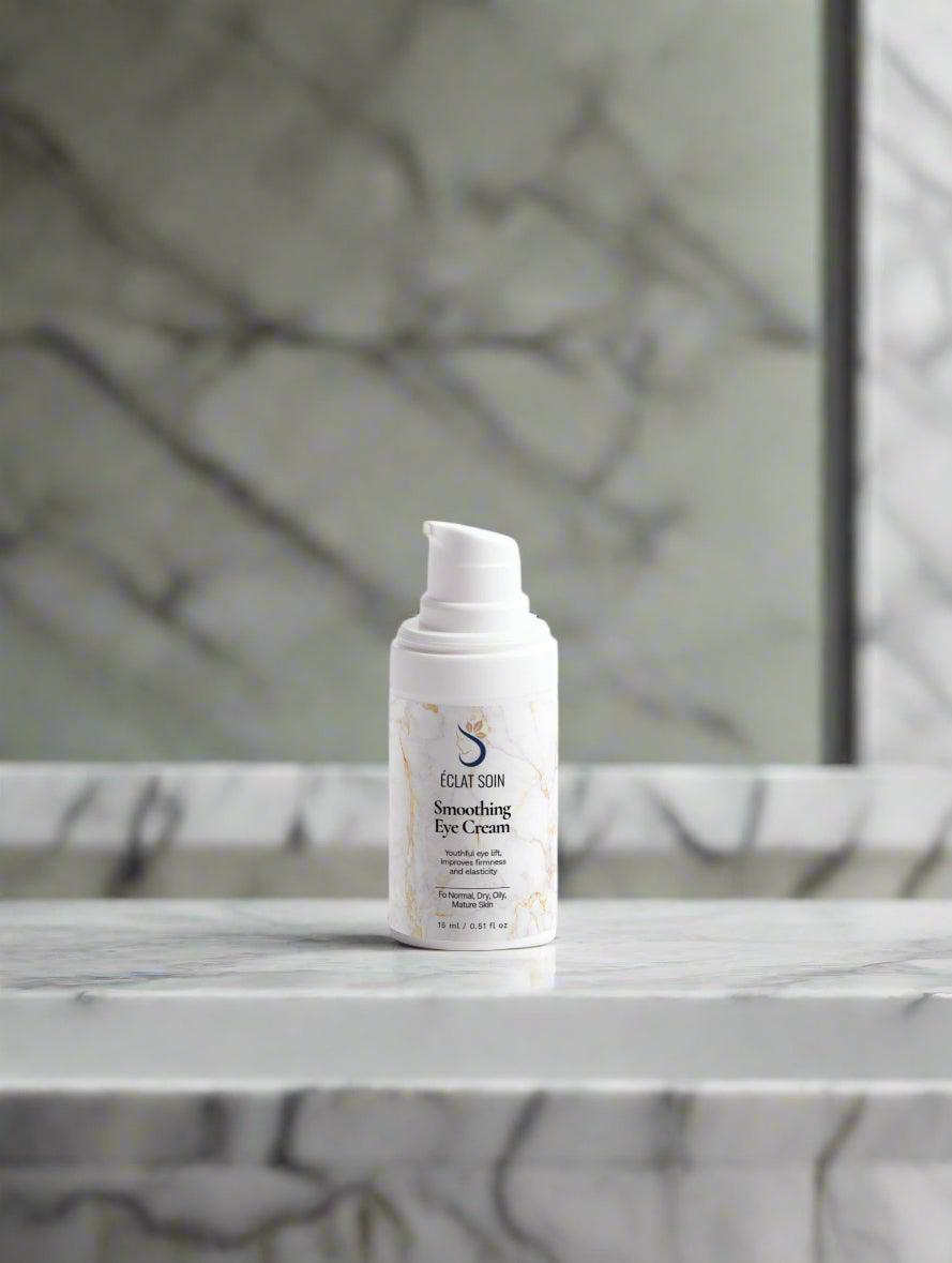 Eclat Soin Smoothing Eye Cream with Ceramides in a sleek bottle on a marble surface